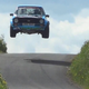 Illustration for article titled Watch A Photographer Run For His Life From This Huge Rally Jump